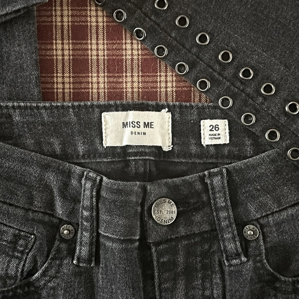 Woman’s Miss Me Jeans With Metal Hole Studs